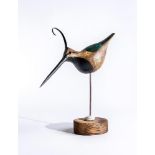 GUY TAPLIN (b.1939), "Lapwing", a carved model with green, black and white markings and curved metal