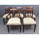 A SET OF FIVE GEORGIAN MAHOGANY DINING CHAIRS including an elbow chair, c.1800, of Sheraton type