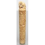 AN INDIAN IVORY STAFF HANDLE, 19th century, of cylindrical section, incise carved with four