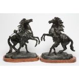 AFTER GUILLAUME COUSTOU (1677-1746), A pair of bronzed spelter(?) Marly horses, each being