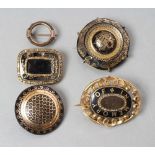 A COLLECTION OF VICTORIAN MOURNING JEWELLERY comprising two pique work tortoiseshell boss