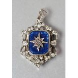 A VICTORIAN DIAMOND PENDANT, the canted blue guilloche enamel centre panel with inset star and