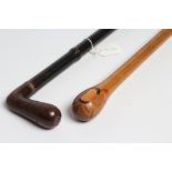 A NOVELTY BAMBOO WALKING STICK, the angular handle with screw off finial forming a pipe bowl, the