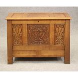 AN ARTS AND CRAFTS STYLE OAK PANELLED CHEST, 20th century, the hinged lid opening to a void