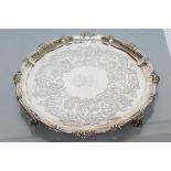 A GEORGE III SILVER SALVER, maker Edward Wakelin, London 1760, of shaped circular form, the pie-