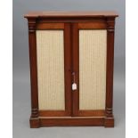 A REGENCY MAHOGANY SMALL PIER CABINET of inverted breakfront form, the moulded edged top and plain