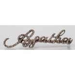 A VICTORIAN DIAMOND NAME BROOCH, Agatha, in script and pave set with numerous graduated rose cut