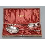 AN AMERICAN TWO PIECE SILVER SERVING SET, stamped Sterling, the Rat Tail type bowl with five prong