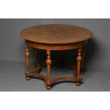 A WALNUT CENTRE TABLE in the William & Mary style, modern, of circular form with ebony stringing,