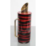 AN ITALIAN TURA COCKTAIL FLASK of plain cylindrical form with dark red and black lacquered