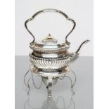 AN EDWARDIAN SILVER SMALL TEA KETTLE ON STAND, maker's mark JG, Birmingham 1903, of semi-fluted