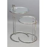 AFTER EILEEN GREY (1878-1976), A pair of E1027 style circular side tables, c.1970's, in tubular