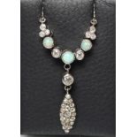 A DIAMOND AND OPAL NECKLACE, the marquise shaped panel pave set with nineteen old brilliant cut