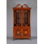 A GEORGIAN STYLE MAHOGANY BOOKCASE, late 19th century, with satinwood banding and marquetry vases