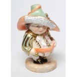 A ROYAL CROWN DERBY CHINA MANSION HOUSE DWARF, 1991, wearing a pale green and apricot hat, inscribed