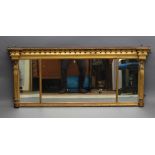 A REGENCY GILT GESSO OVERMANTEL MIRROR, early 19th century, the cavetto cornice applied with orbs,