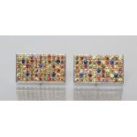 A PAIR OF MULTI-GEM SET SILVER CUFFLINKS, the oblong panels point set with yellow, orange, blue