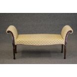 AN ADAMS STYLE CARVED MAHOGANY WINDOW SEAT, modern, upholstered in a yellow floral weave, scrolled