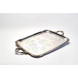 A GEORGE V SILVER TRAY, maker Walker & Hall, Sheffield 1910, of rounded oblong form with straight