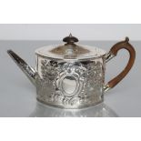 A LATE GEORGE III SILVER TEAPOT, maker's mark WP, London 1810, of plain oval form, the flat hinged