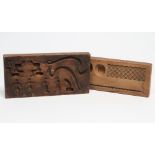 TWO SOFTWOOD PASTRY MOULDS, late 19th century, one incise carved with figures and birds to one side,