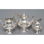 AN EARLY VICTORIAN SCOTTISH THREE PIECE TEA SERVICE, maker's mark RS, Glasgow 1849, of swept