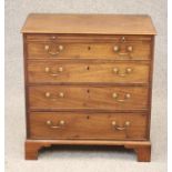 A SMALL GEORGIAN MAHOGANY CHEST, late 18th century, the moulded edged top over brushing slide and