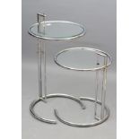 AFTER EILEEN GREY (1878-1976), A pair of E1027 style circular occasional tables, c.1970's, the