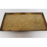 A KESWICK SCHOOL OF INDUSTRIAL ART LARGE BRASS TRAY, of plain oblong form, repousse with scrolling
