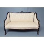 A VICTORIAN MAHOGANY SHOW WOOD TWO SEATER SOFA, upholstered in champagne silk damask, the padded