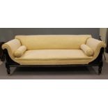 A VICTORIAN EBONISED AND PARCEL GILT CLUB SETTEE in the Aesthetic taste, upholstered in cream