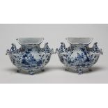 A PAIR OF DUTCH DELFT BOUGH POTS, mid 19th century, of lobed form, the central aperture flanked by