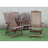 A SET OF FOUR TEAK FOLDING CHAIRS by Royal Croft, of slatted steamer type with arched top rails,