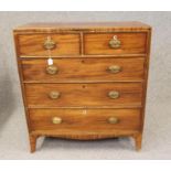 A GEORGIAN MAHOGANY CHEST, late 18th century, of straight front form with caddy top over an inlaid