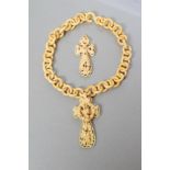 A VICTORIAN IVORY CROSS PENDANT of open form, carved with lily of the valley and other flowers, 3