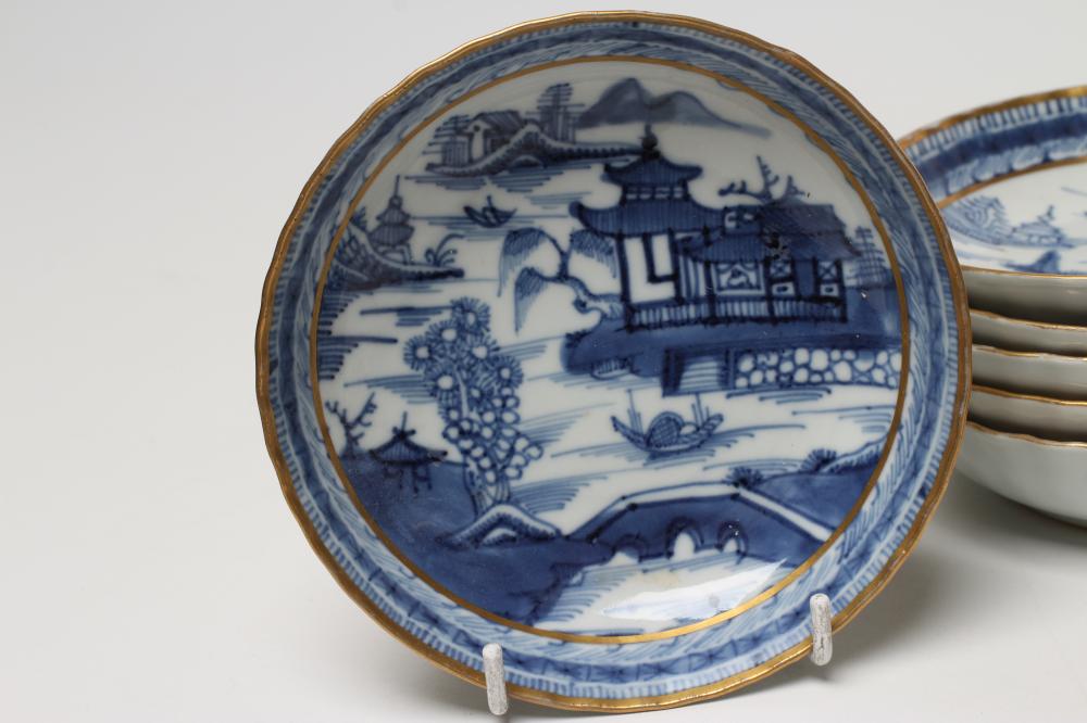 A SET OF SIX CHINESE PORCELAIN RIBBED TEABOWLS AND SAUCERS painted in underglaze blue with a - Image 2 of 4