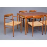 A HENRY W. KLEIN FOR BRAMIN DANISH TEAK DINING TABLE AND CHAIRS, the rounded oblong extending