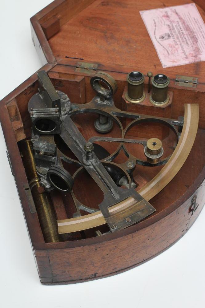 A BRASS SEXTANT by D. McGregor & Co. Glasgow, c.1900, with three lenses and silvered scale, in