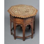 AN INDIAN HARDWOOD OCCASIONAL TABLE, c.1900, of octagonal form inlaid in bone and ebony with flowers