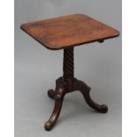 A GEORGIAN MAHOGANY TRIPOD TABLE, 18th century, possibly Irish, the rounded square tip up top on