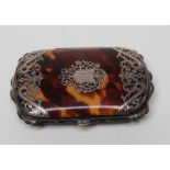 A VICTORIAN TORTOISESHELL PURSE of rounded oblong form with silver pique scroll work enclosing