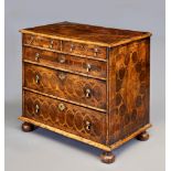 A WILLIAM & MARY STYLE WALNUT AND LABURNUM OYSTER VENEERED CHEST, 19th century,