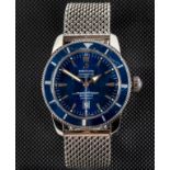 A GENTLEMAN'S STAINLESS STEEL BREITLING "SUPEROCEAN" AUTOMATIC CHRONOMETER, the blue dial with