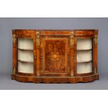 A VICTORIAN WALNUT AND GILT METAL MOUNTED CREDENZA, of breakfront form with rounded ends and