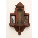 AN EDWARDIAN ROSEWOOD WALL BRACKET, with stringing and applied gilt banding, the raised centre