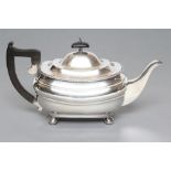 A TEAPOT, maker Carringtons, London 1937, of plain rounded oblong baluster form, with everted