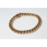 A FLAT CURB LINK CHAIN BRACELET, stamped 585, 8 1/2" long, 46.5g (Est. plus 21% premium inc. VAT)