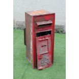 A GEORGE VI CAST IRON RED POSTAL BOX, wall mounted, 13 3/4" x 13 1/4" x 33 1/2", with fitted