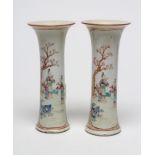 A PAIR OF CHINESE PORCELAIN VASES of waisted cylindrical form painted in coloured enamels with