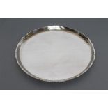 A SALVER, maker probably Camusso (Hand Crafted Peru), 925 Peru, of plain circular form with raised